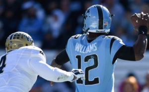 Bam_Bradley attempts to tackle North_Carolina QB Marquise Williams